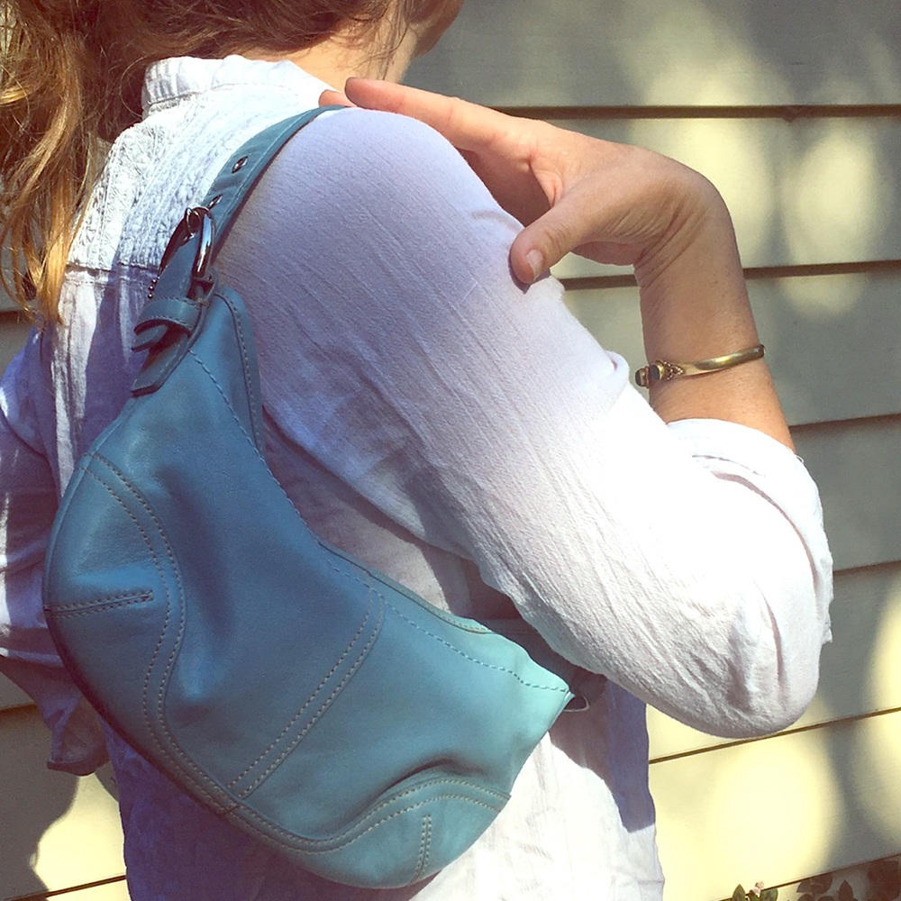 Blue leather coach purse